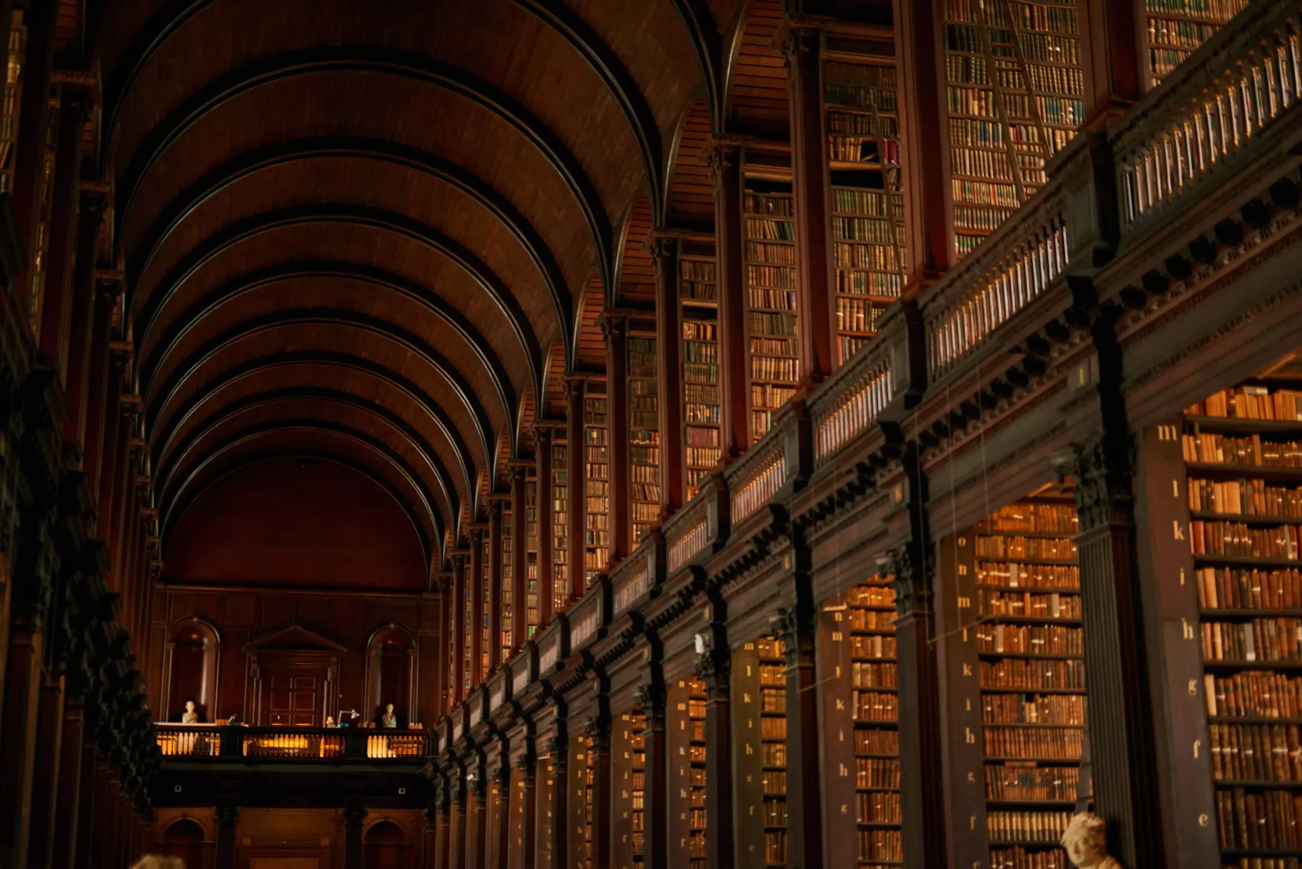 Tall bookshelves and reading galleries in a historic library